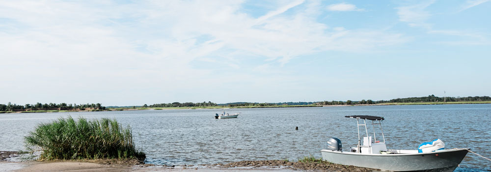 Boat docked on the river